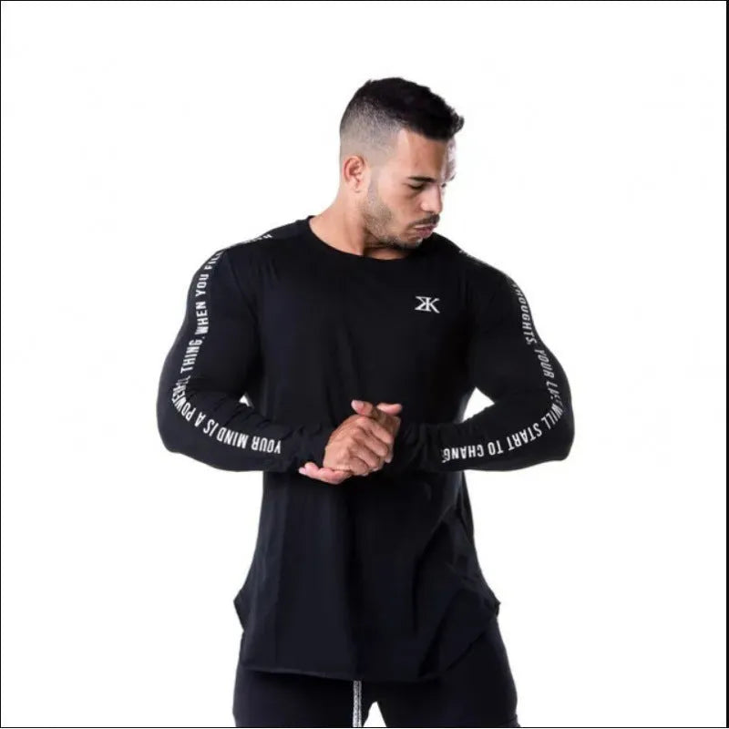 Men's milk silk long sleeve round neck fitness top with letter print in black, shown on a dark background