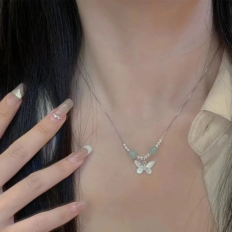 Women's Hetian jale and silver butterfly jewellery set with matching bracelet and necklace