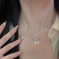 Women's Hetian jale and silver butterfly jewellery set with matching bracelet and necklace