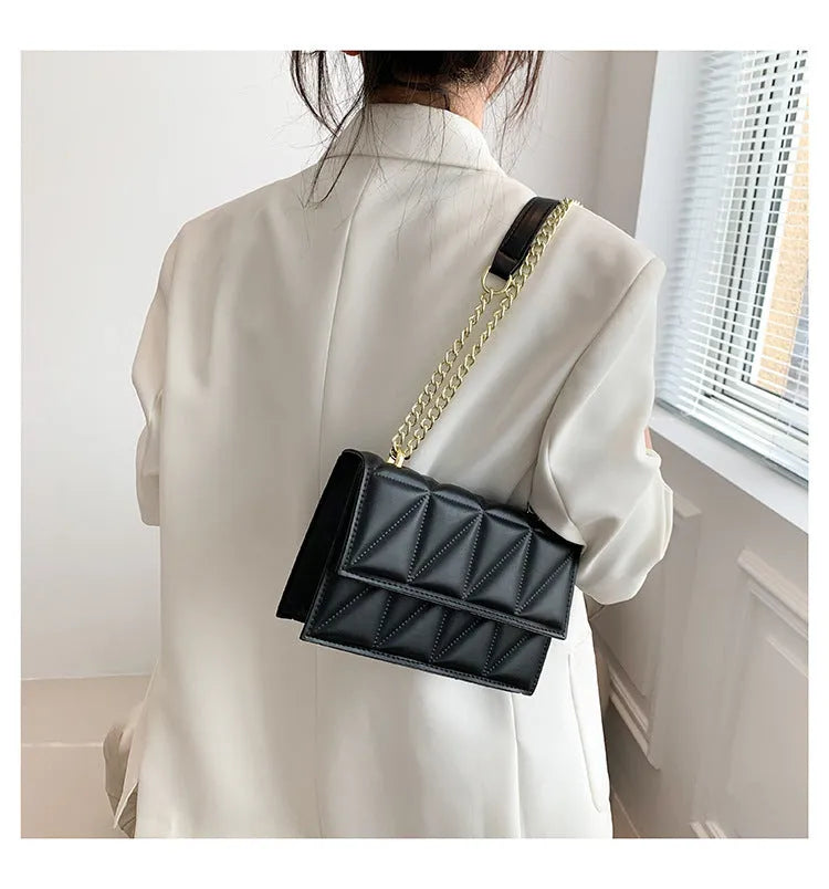 Small square crossbody shoulder bag in PU leather with chain and shoulder strap, available in five colours, 22cm width