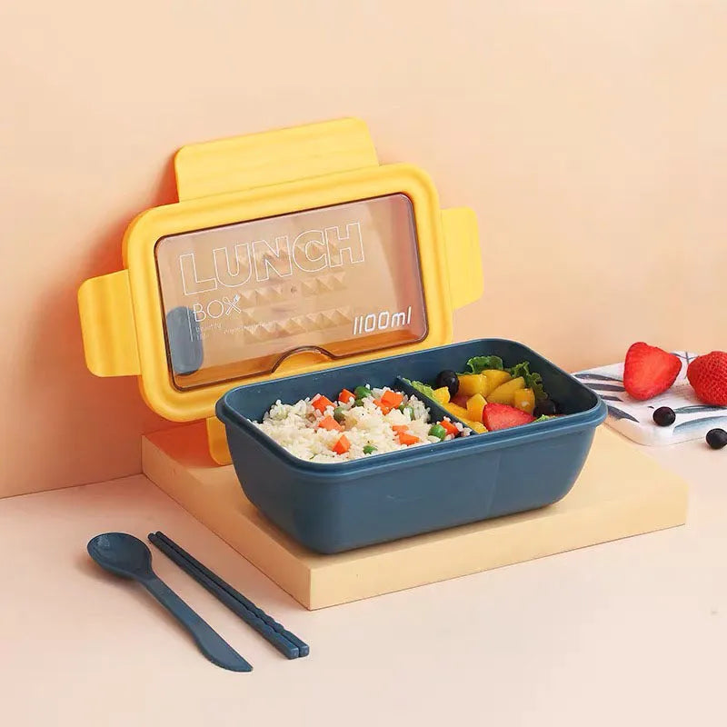Four-layer partitioned plastic bento lunch box in Nordic style showing green, red and yellow colour options