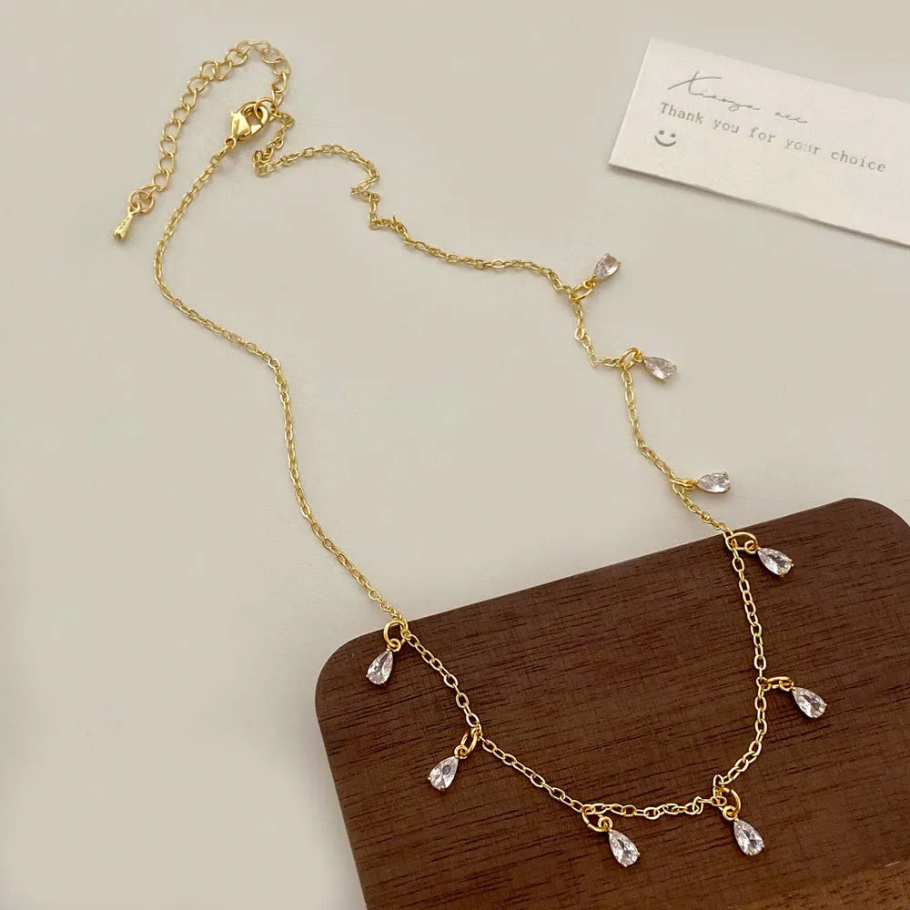 Geometric zircon jewellery set with necklace, earrings and anklet in Korean-style meteor shower design