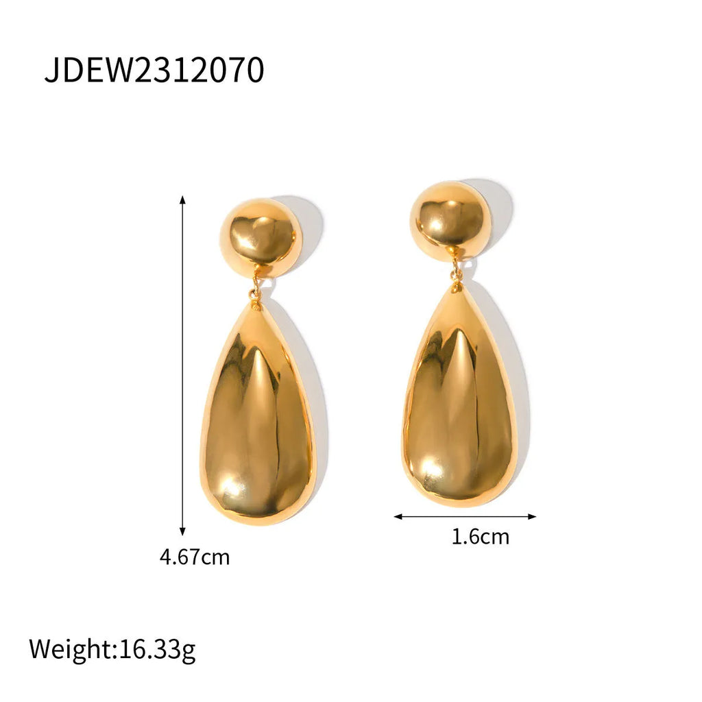 A pair of gold-coloured stainless steel pendant earrings with a geometric water drop hemisphere shape.