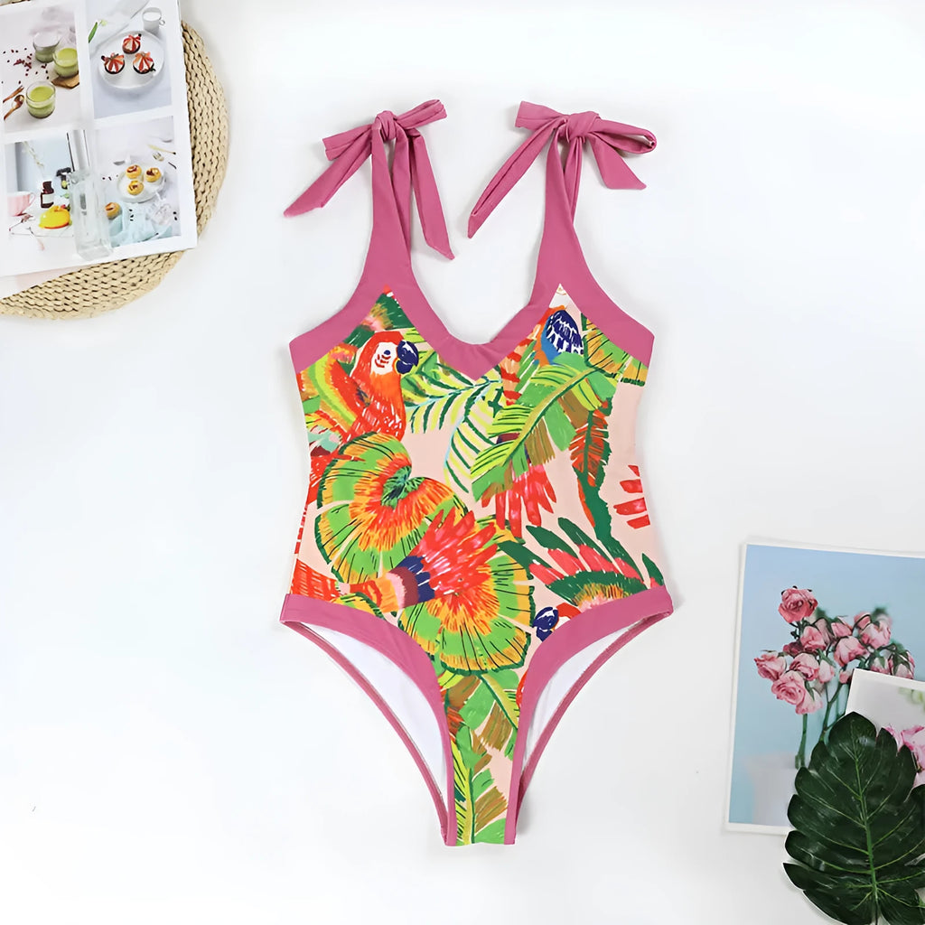 Pink floral print retro one-piece swimsuit with V-neck, covered belly, and thin skirt swim dress design