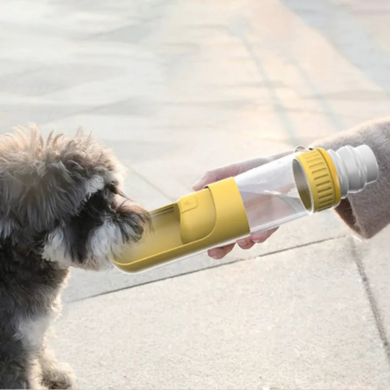 Dark blue portable dog water bottle with built-in bowl and leak-proof cap.