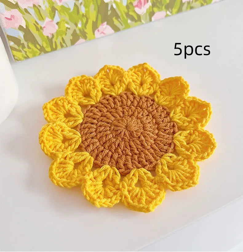 Hand-woven circular wool coaster with flower pattern, 10cm diameter