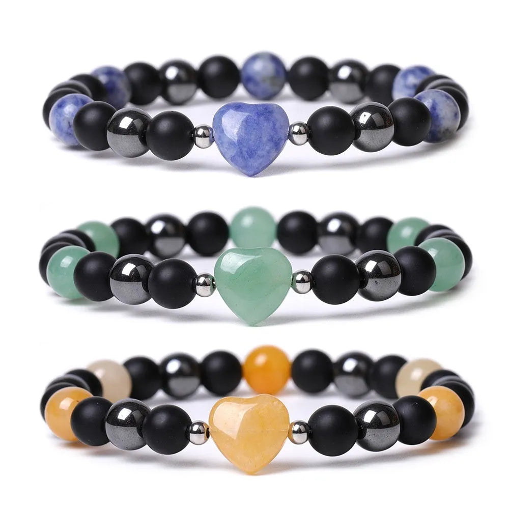 Hand-cut geometric peach heart stone bracelet with moon symbols in tigereye colour