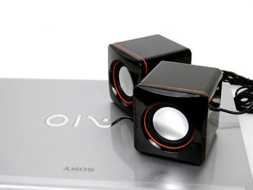 Small black square USB-powered computer speaker for 700B PC desktop