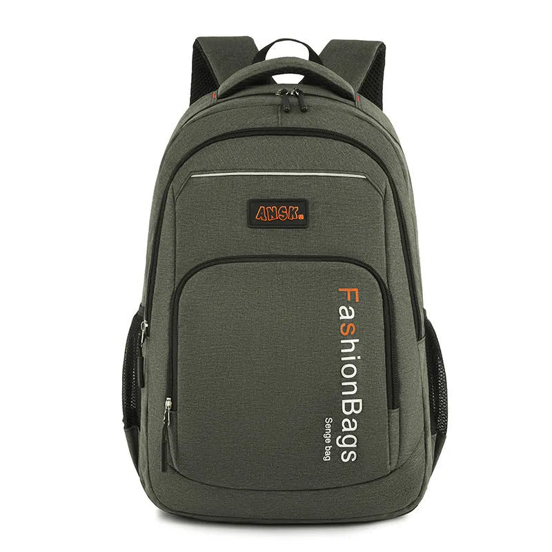 Street trend fashion backpack in grey showing double shoulder straps and front zip pocket.