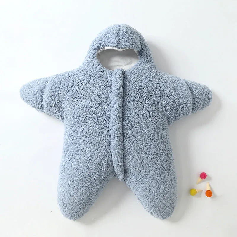 Cashmere and cotton baby sleeping bag with hood, shown in pink, grey, light blue, or khaki.