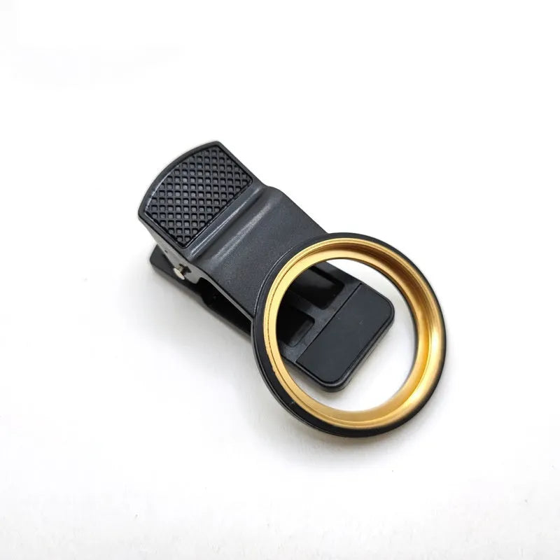 37mm universal clip phone lens filter adapter with golden or black spiral teeth and large hole for screw-on filters.