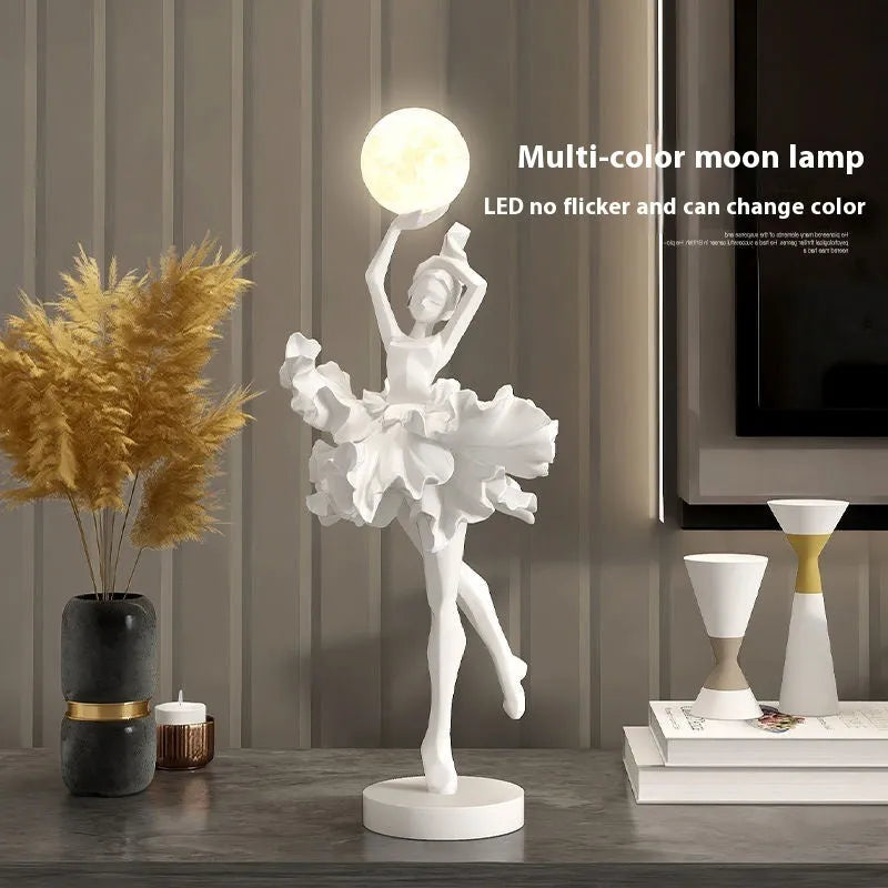 Small modern resin night light ornament with USB cable in black gold colour.