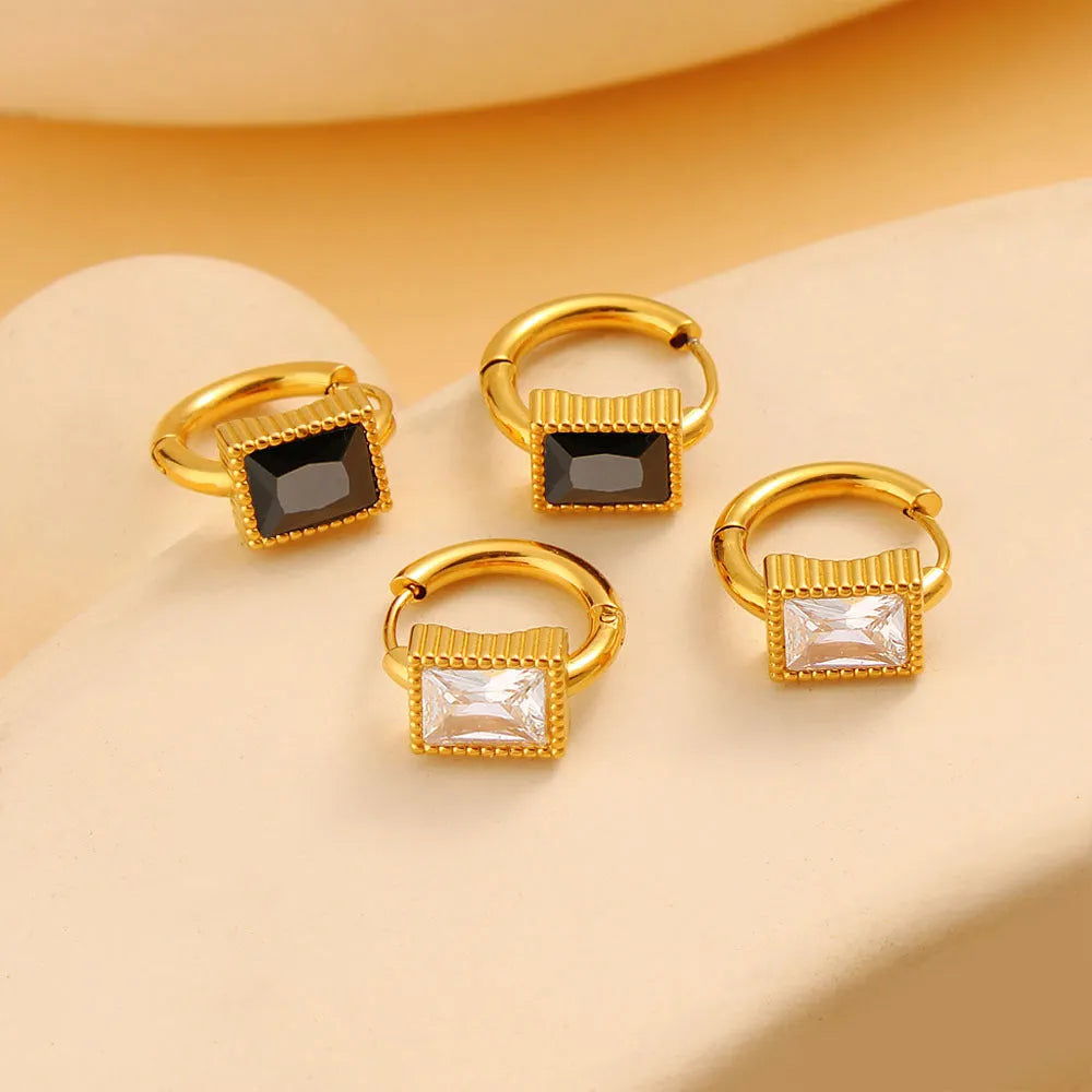Square geometry design stainless steel earrings with a round zircon stone in black, green or white.