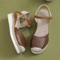 Women's beige hemp rope platform wedge shoes with round toe and PU leather upper.