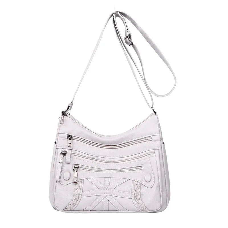 Soft PU casual messenger bag with multi-layer multi-pocket design in black colour