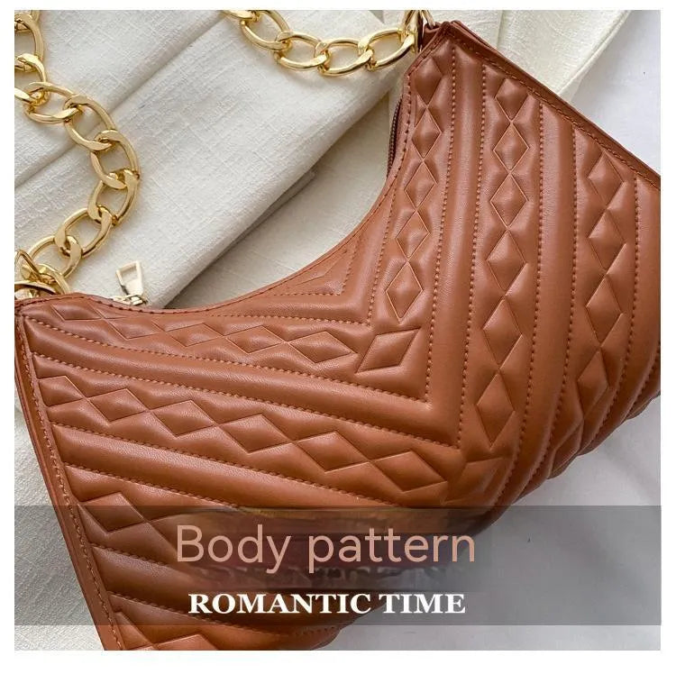 Brown pleated chain shoulder bag with square shape and adjustable metal strap