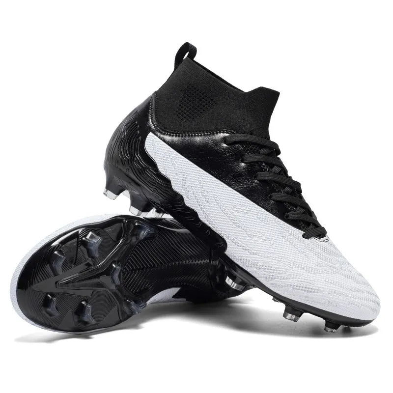 Breathable spike football boots with PVC upper and lace-up closure on grass
