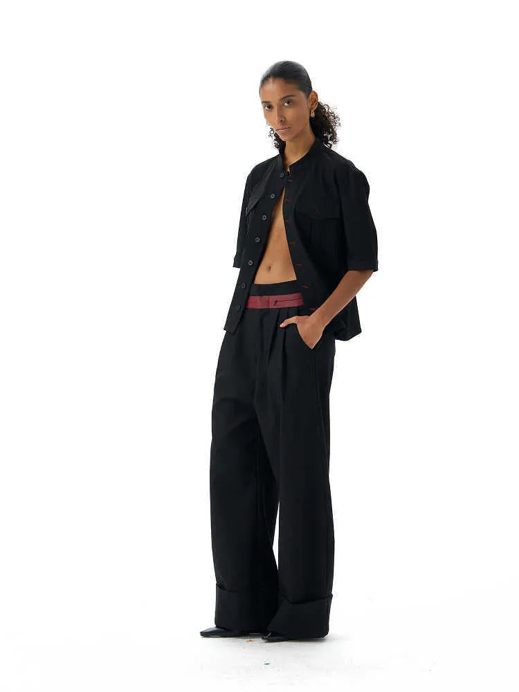 Handmade black half sleeve men's shirt with a shirt collar and loose fit for casual hunting wear.