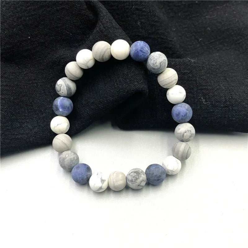 Handmade men's planet stone bracelet with starry sky beads in a U-shaped design.