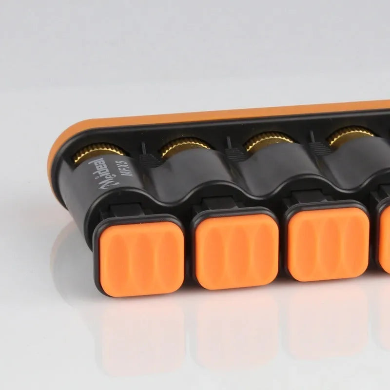 Grey and orange silicone finger trainer for hand strength, used for music practice and climbing.