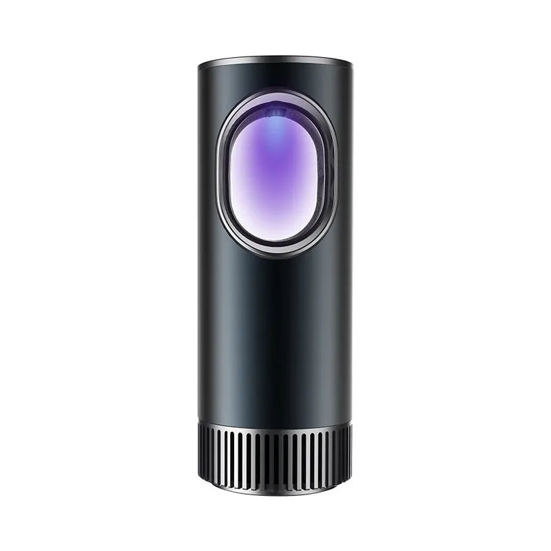 Black USB car air purifier for formaldehyde removal and ion generation on a car dashboard