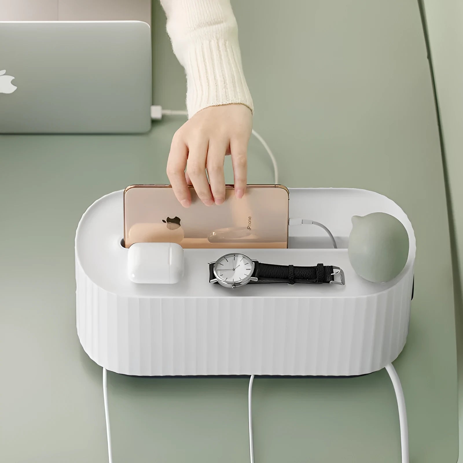 Blue and white power strip storage box with lid open showing cable management holes