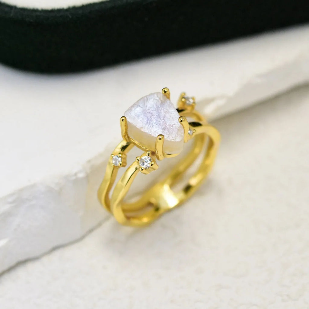 S925 sterling silver moonstone ring with irregular triangle geometry on model finger