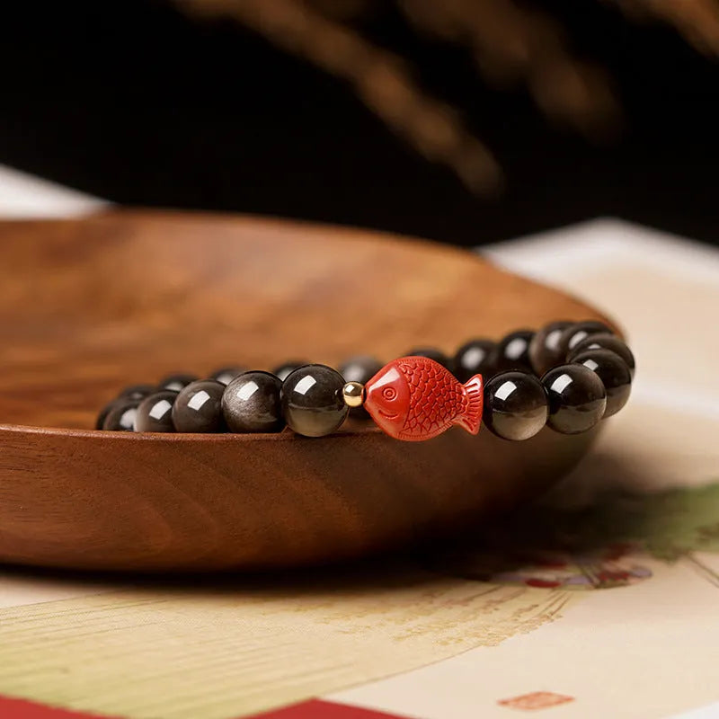 Natural obsidian and cinnabar round bead bracelet shown in three size options.