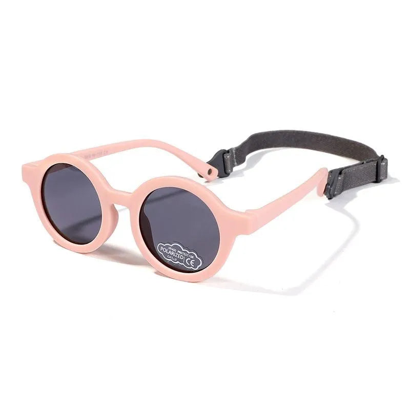Children's silicone sunglasses for 0-3 year olds with round frame and polarized lenses in multiple colour options
