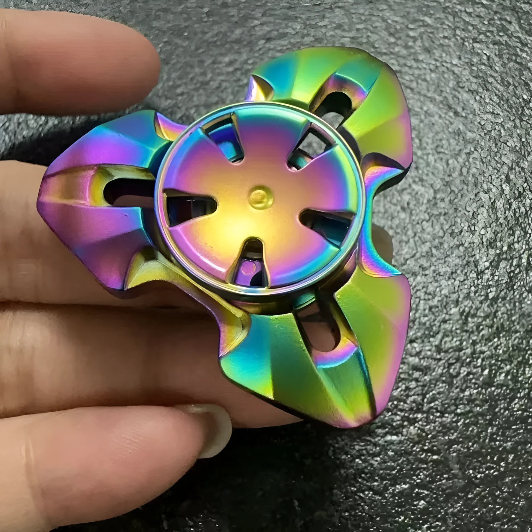 Alloy rotating fingertip gyro decompression toy in gun colour and colourful options
