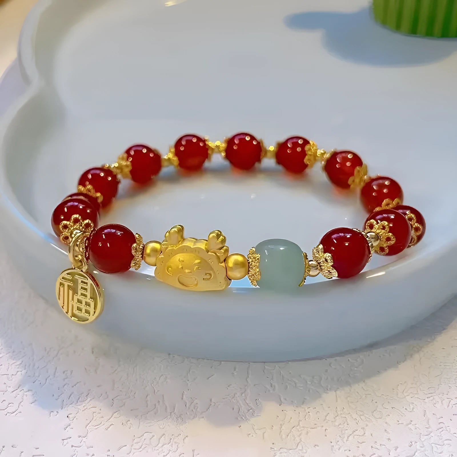 Women's floral glazed bracelet with zodiac animal charm in red, pink or white bead colours