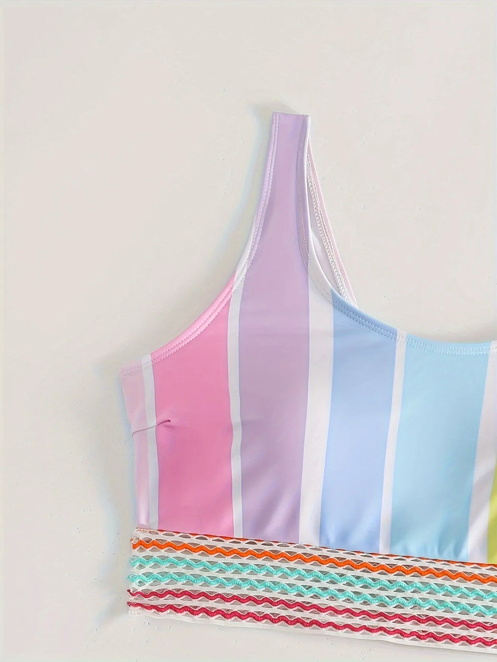 Women's striped two-piece bikini set in briefs style, shown in picture colour, for swimming and sports.