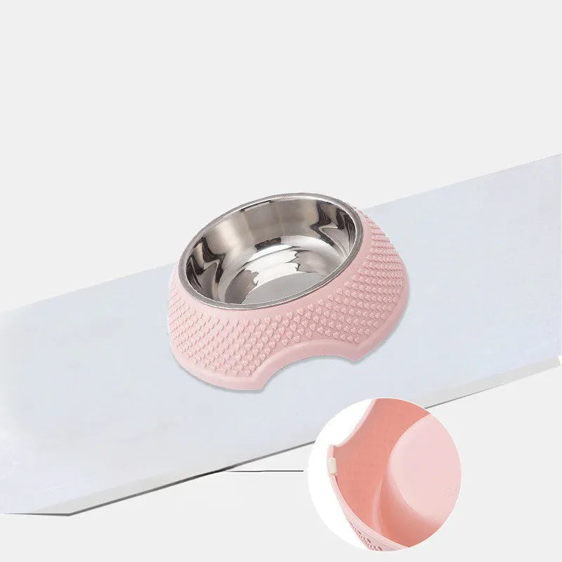 Blue stainless steel pet bowl with a non-slip base for cats and dogs on a floor.