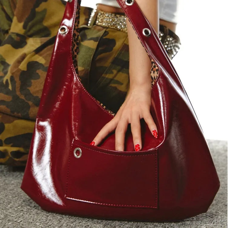 Red leopard print women's retro shoulder bag with dumpling shape and two-side straps.