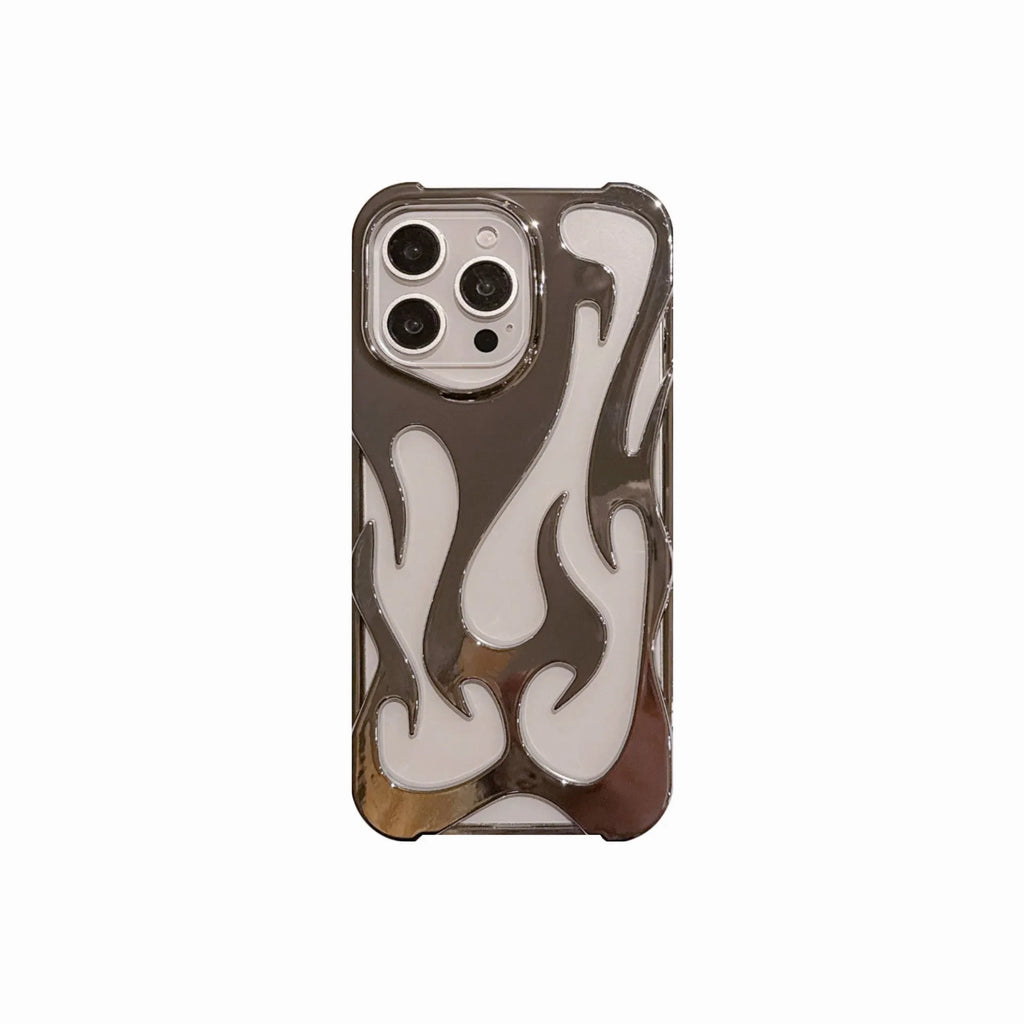 Silver electroplated iPhone case with hollow flame pattern design on a table