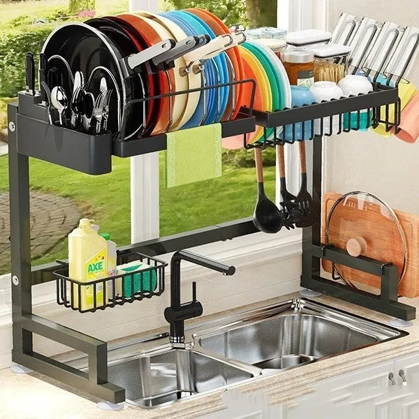 Black retractable metal kitchen draining rack with water pot holder on countertop