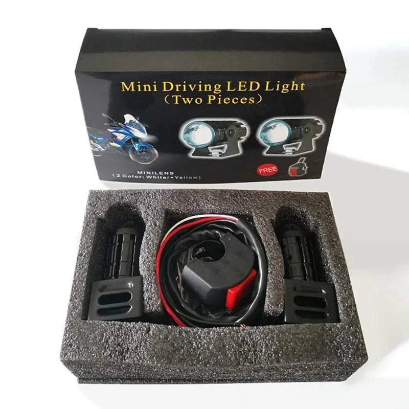 Motorcycle spotlight with dual colour lens in aluminium PC housing measuring 6x6x7cm