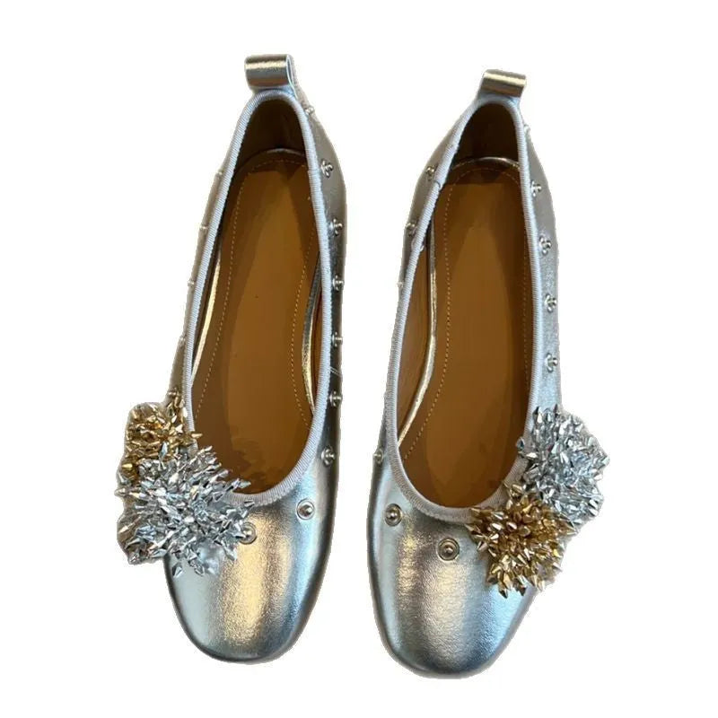 Silver DIY flower rivet Mary Jane shoes with a buckle, showing the round toe and flat rubber sole.