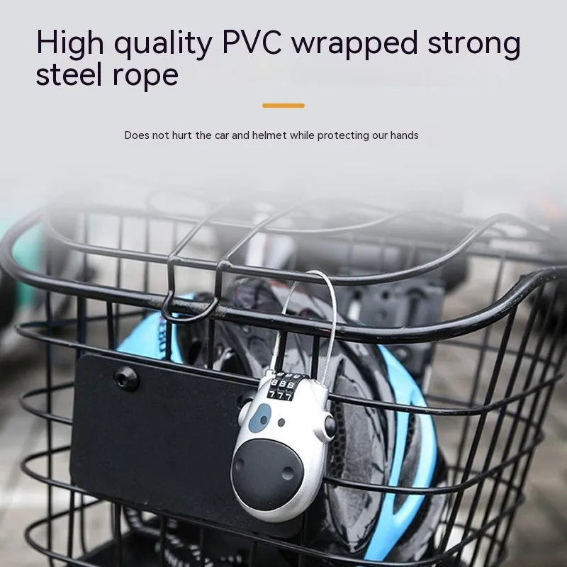 Retractable motorcycle helmet lock with extended steel cable next to bicycle helmet