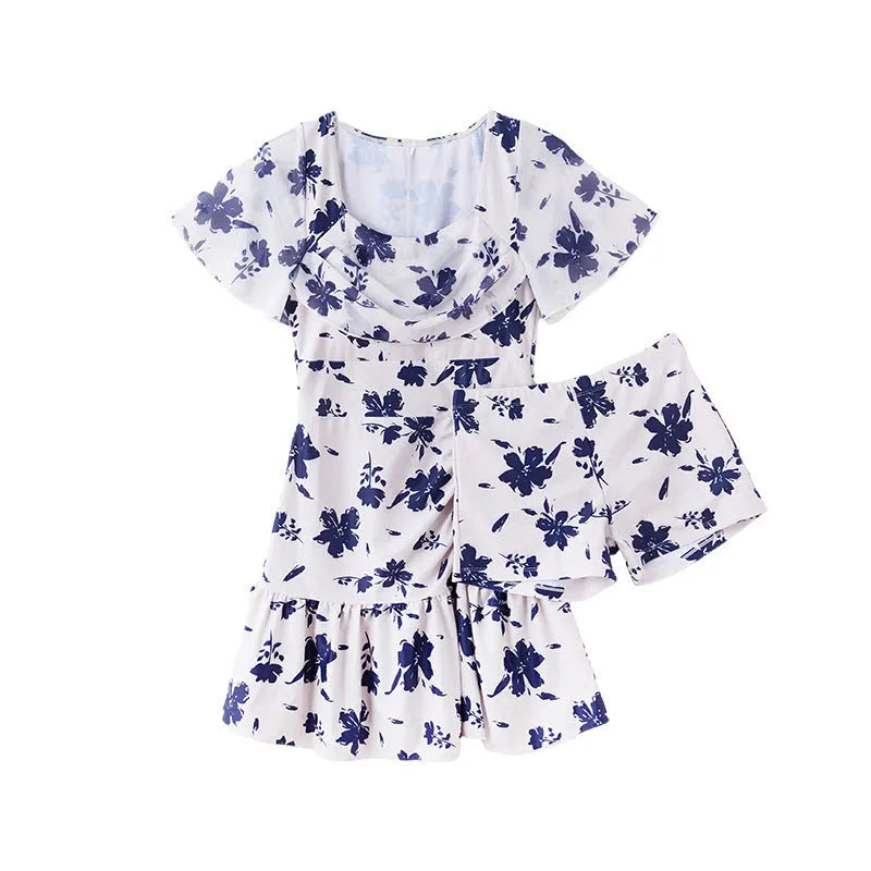 Women's white mesh short sleeve one-piece swimming dress on a mannequin.