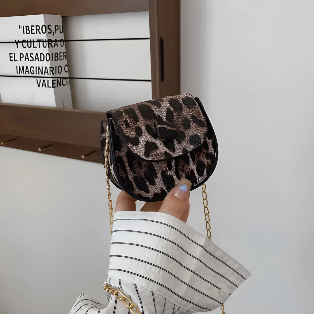 Leopard print mini crossbody saddle bag in PU, horizontal square shape with sandwich pocket, black and reddish brown