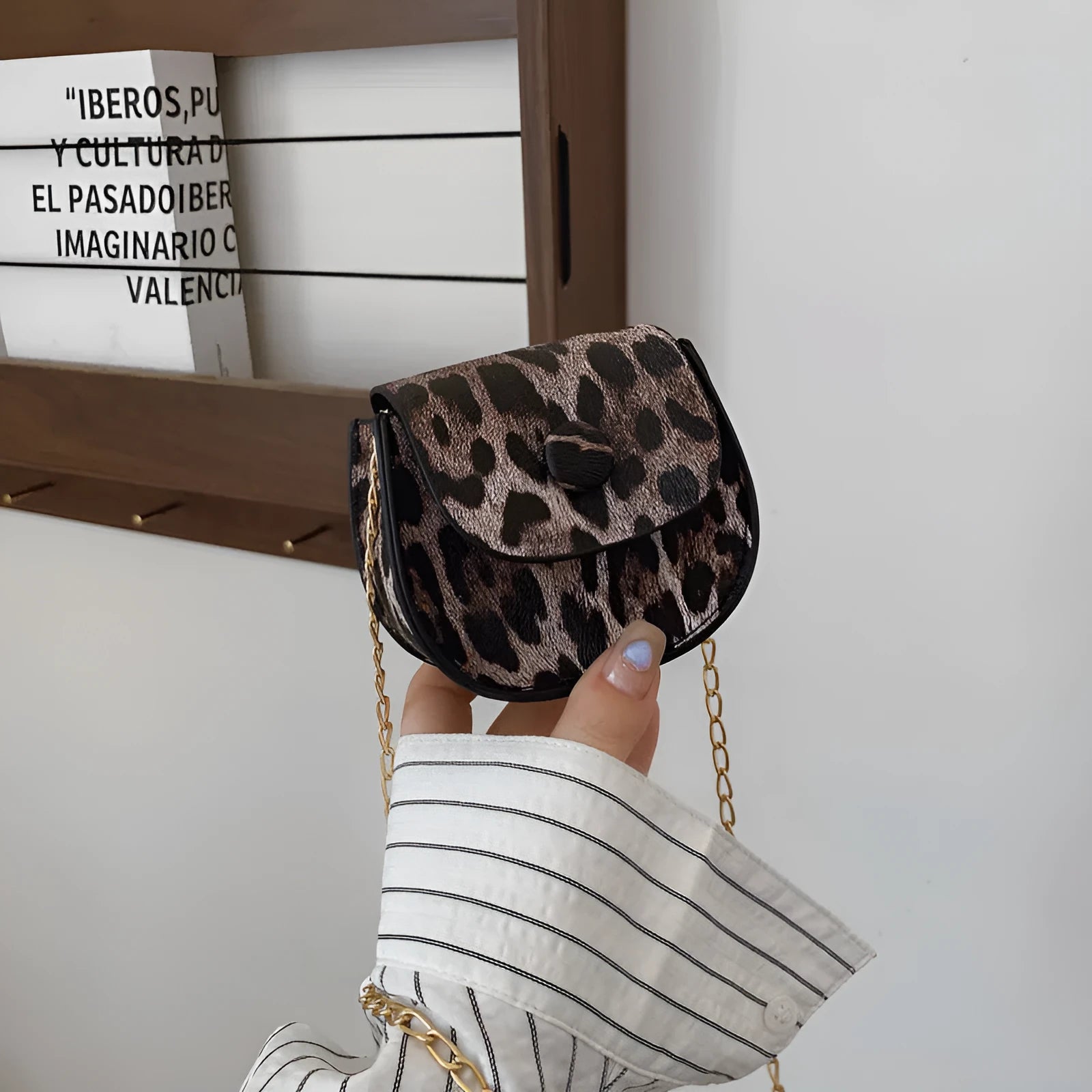 Leopard print mini crossbody saddle bag in PU, horizontal square shape with sandwich pocket, black and reddish brown