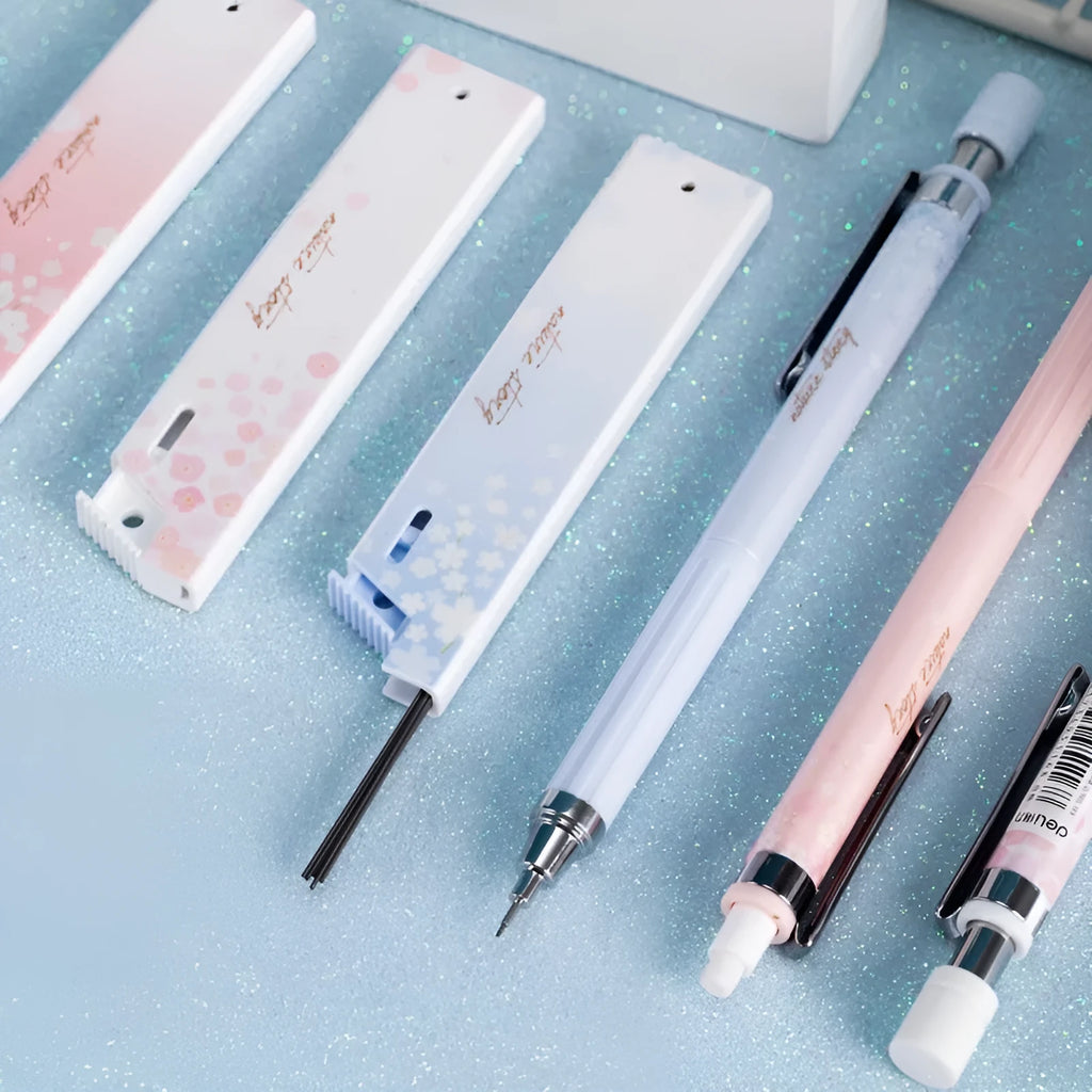 Sakura law style cartoon automatic pencil set with three 0.5mm pencils and HB refill boxes.