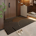 Polyester non-slip entrance door mat with geometric pattern in grey, placed on a tiled floor