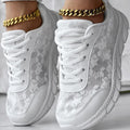 Women's lightweight canvas running shoes with soft sole in white, black, blue, or pink colour options.
