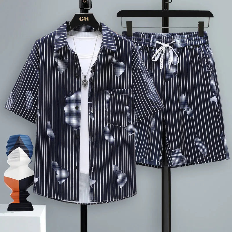 Men's casual sports shorts set in blue, showing short sleeve top and matching polyester shorts.
