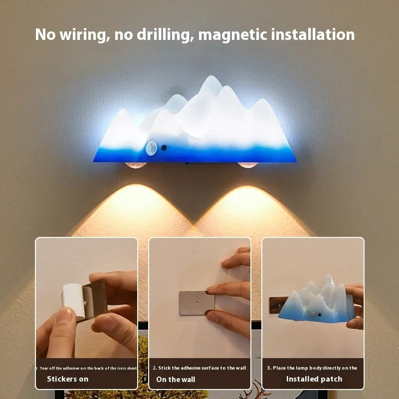 Snow Mountain sensor chargeable night lamp with remote control in modern simplicity style on a bedside table