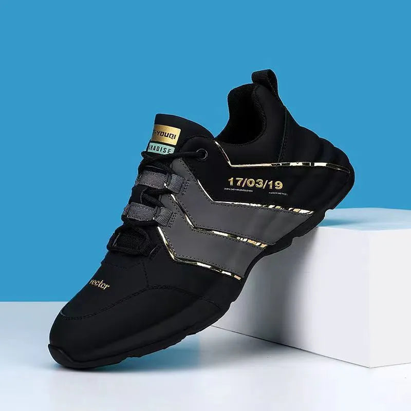 Casual low-top sneakers with a thick plastic sole and mesh lining in grey and black colourway.