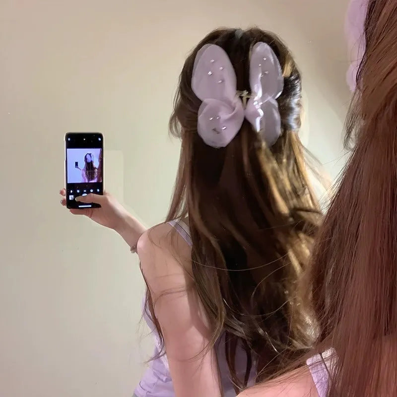 Tulle butterfly hair clip in French retro mesh design, available in five solid colours for women.