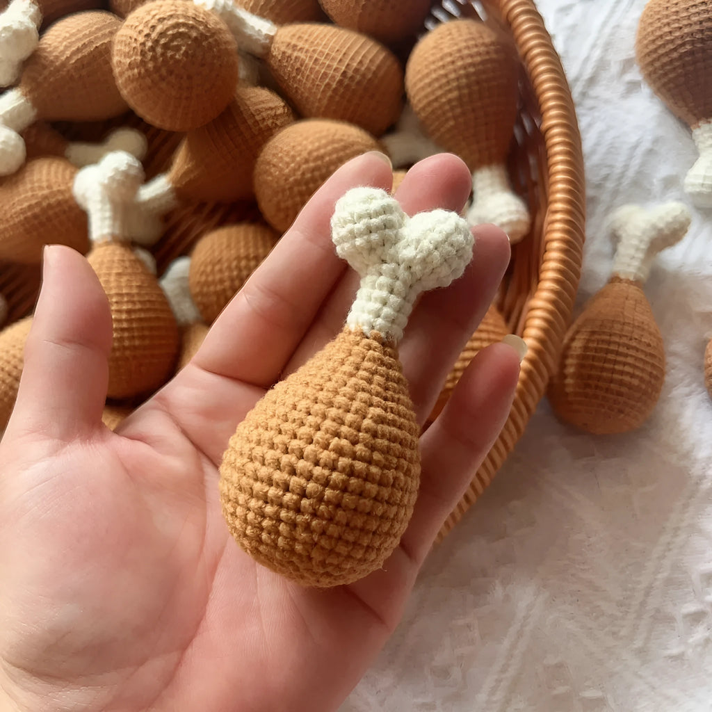 Crocheted plush chicken leg pendant key chain measuring 8cm in length.